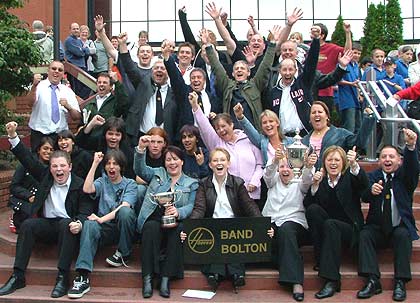 Members of the Hoover (Bolton) Band celebrating outside the Harrogate Conference Centre