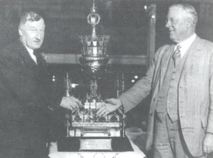 Fodens being presented with the .trophy in 1930 E. R.  Foden receives the cup from John Henry Iles