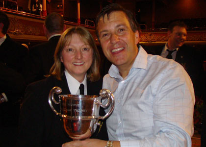 Childs family with trophy