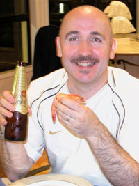 Shrimp and a bottle of Crown with Roger Webster