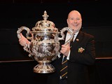 Phil Green enjoys his moment with a bit of
silverware...