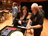 Ray Payne providing the assistance and percussion expertise on stage