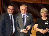 Paul and Jacqui Beer receive their long service award